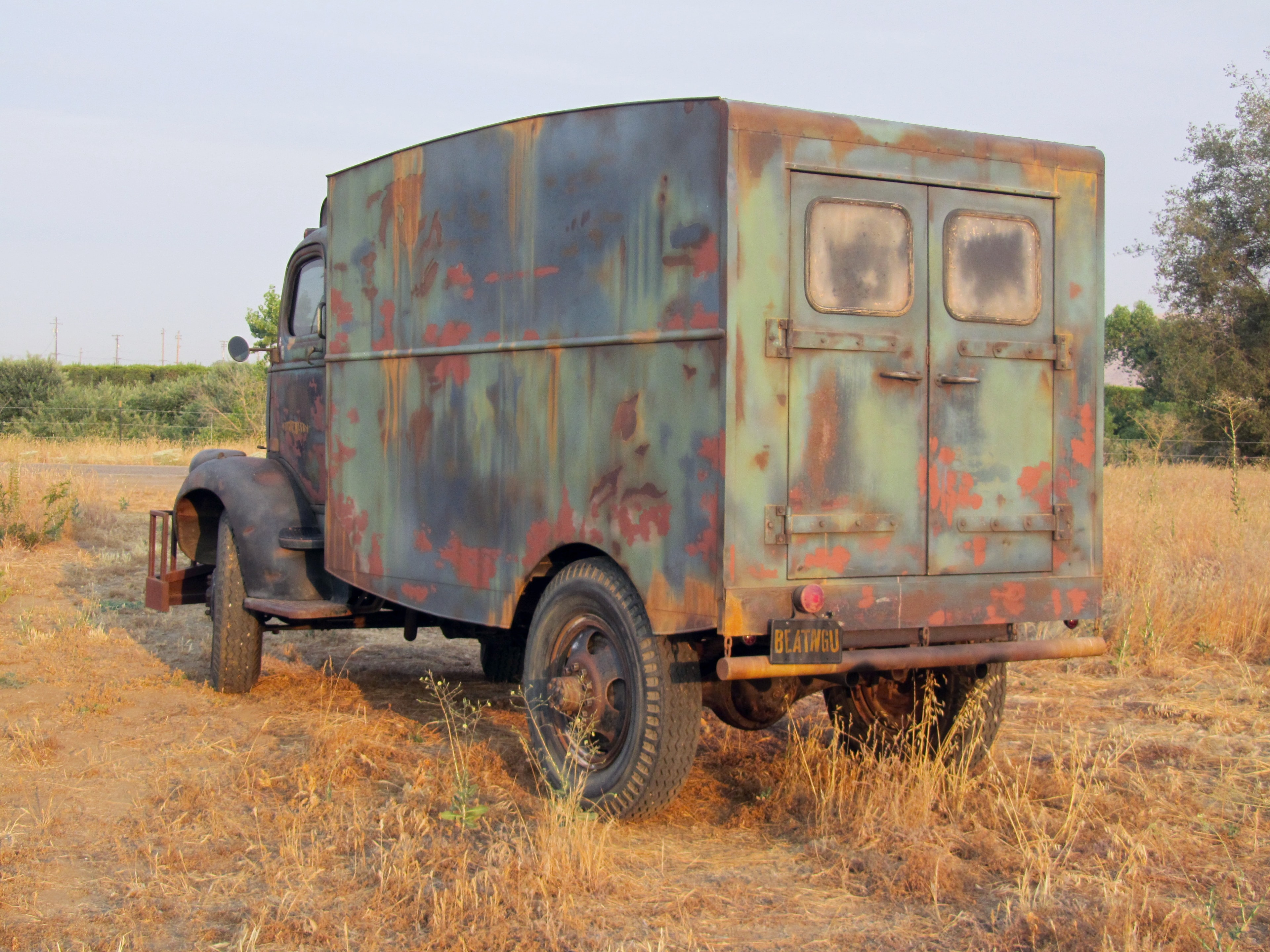 Vintage truck rear tailgate dramatic sky