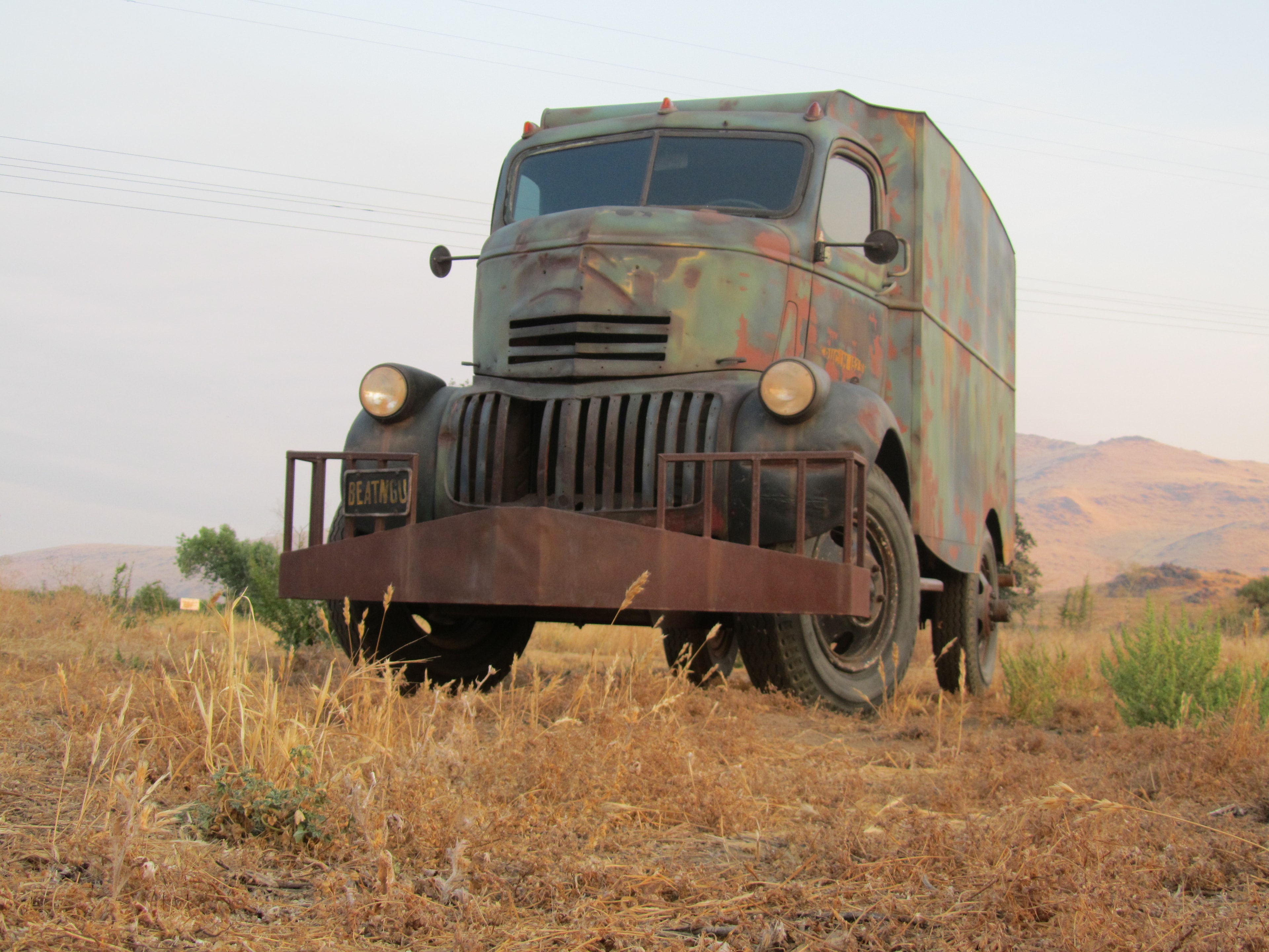 Old truck front headlights grille at night